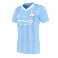 Stroje piłkarskie Manchester City Jeremy Doku #11 Koszulka Podstawowej dla damskie 2023-24 Krótki Rękaw